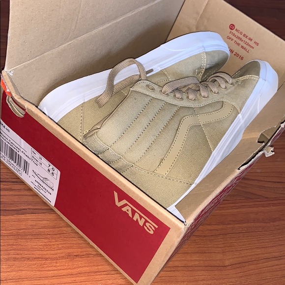 khaki high top vans